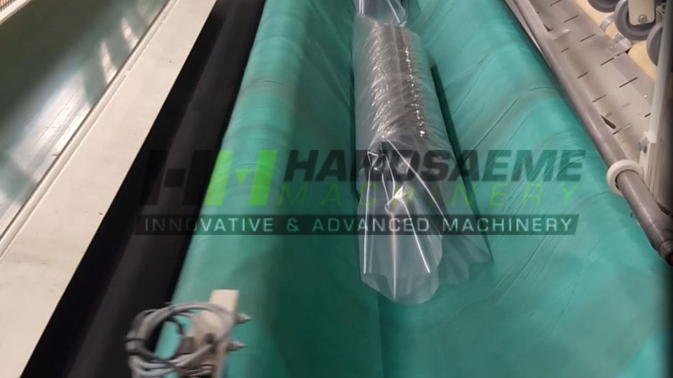 Roll in packaging machine  for textile rolls